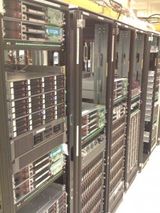 Picture of 4 racks with servers and storage in them